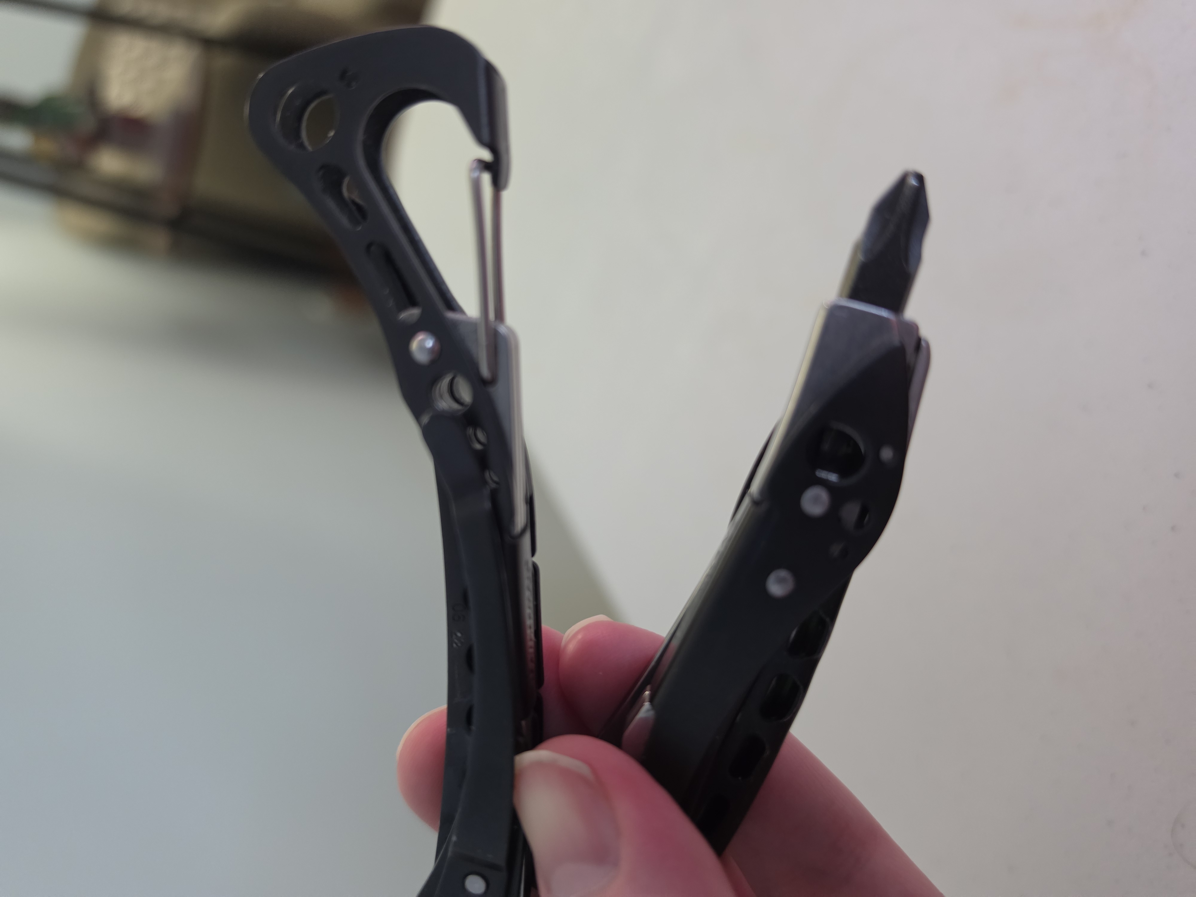 Leatherman Skeletool CX � open, tools deployed
